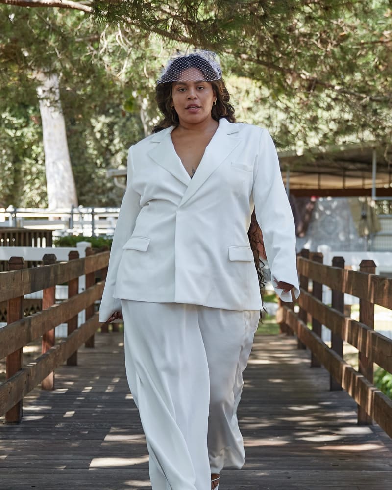 Front of a model wearing a size 22 Katharine Tuxedo in White by Houghton by Katharine Polk. | dia_product_style_image_id:293147
